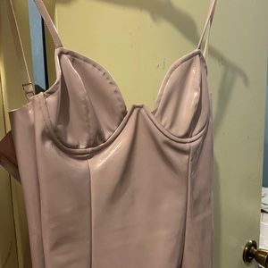 Hi I’m selling a light purple latex dress with underwire